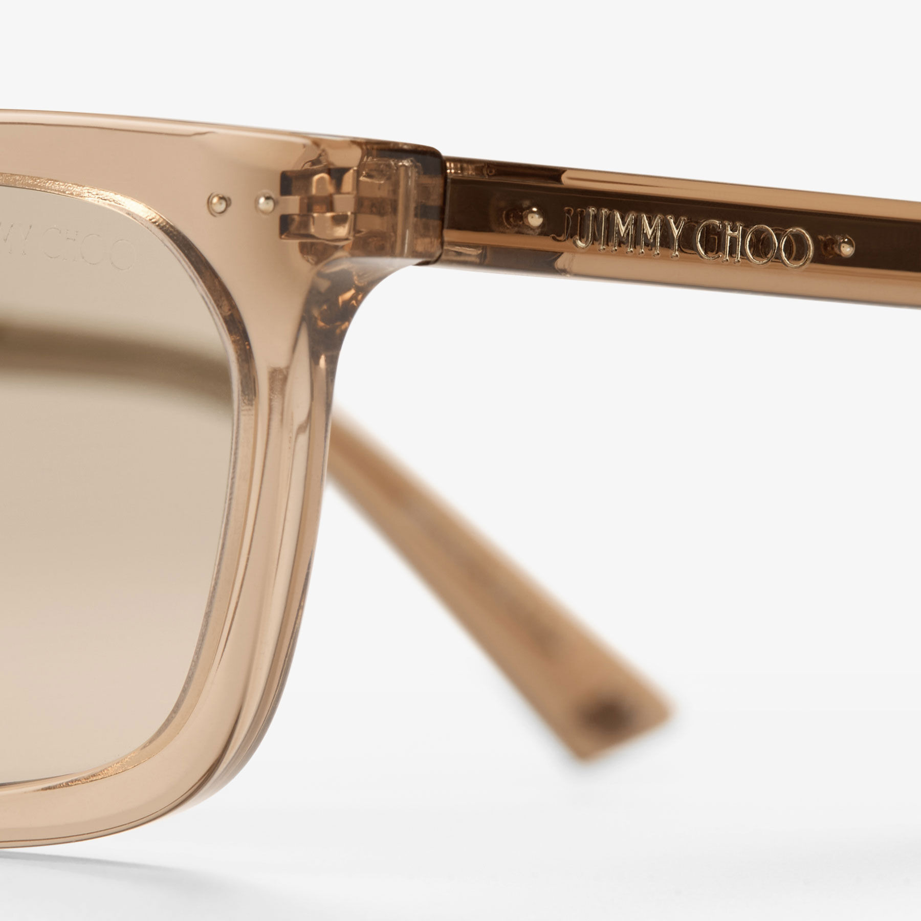 Josi
Transparent Tan Rectangular Sunglasses - 3