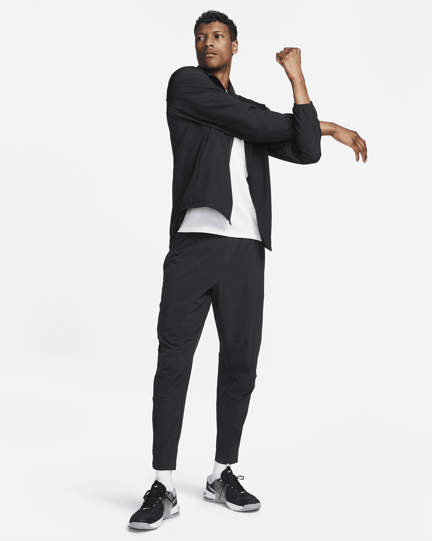 Nike Unlimited Men's Dri-FIT Zippered Cuff Versatile Pants - 7