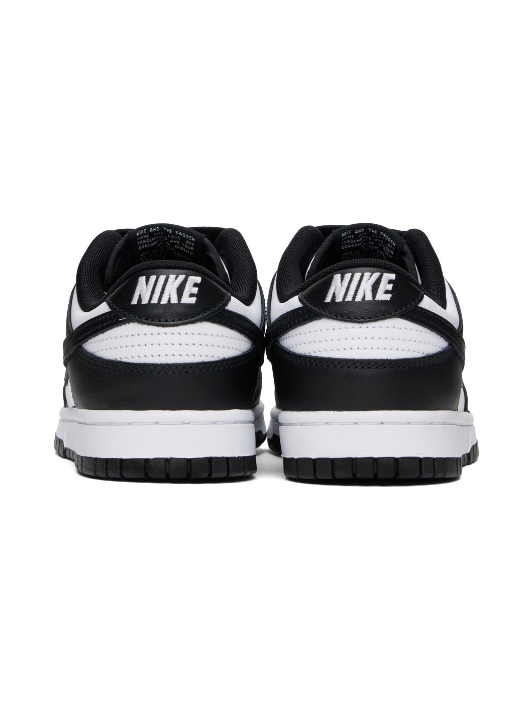 Nike White & Black Dunk Low Retro Sneakers | ssense | REVERSIBLE