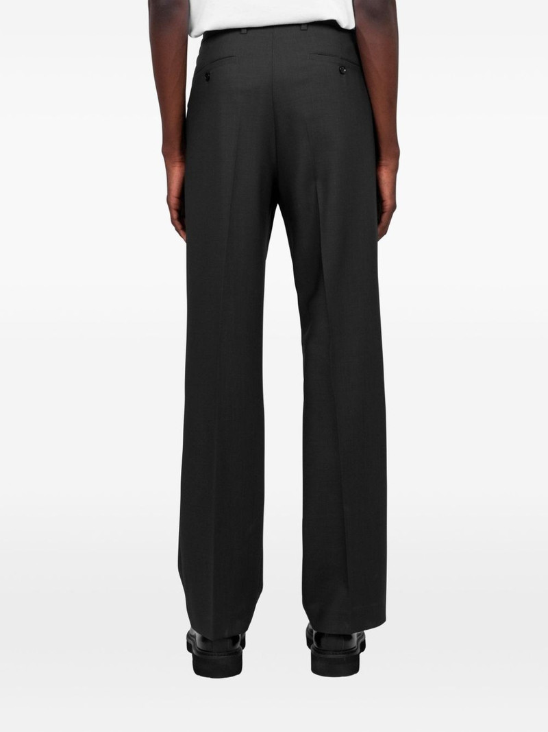 button fastening trousers 3