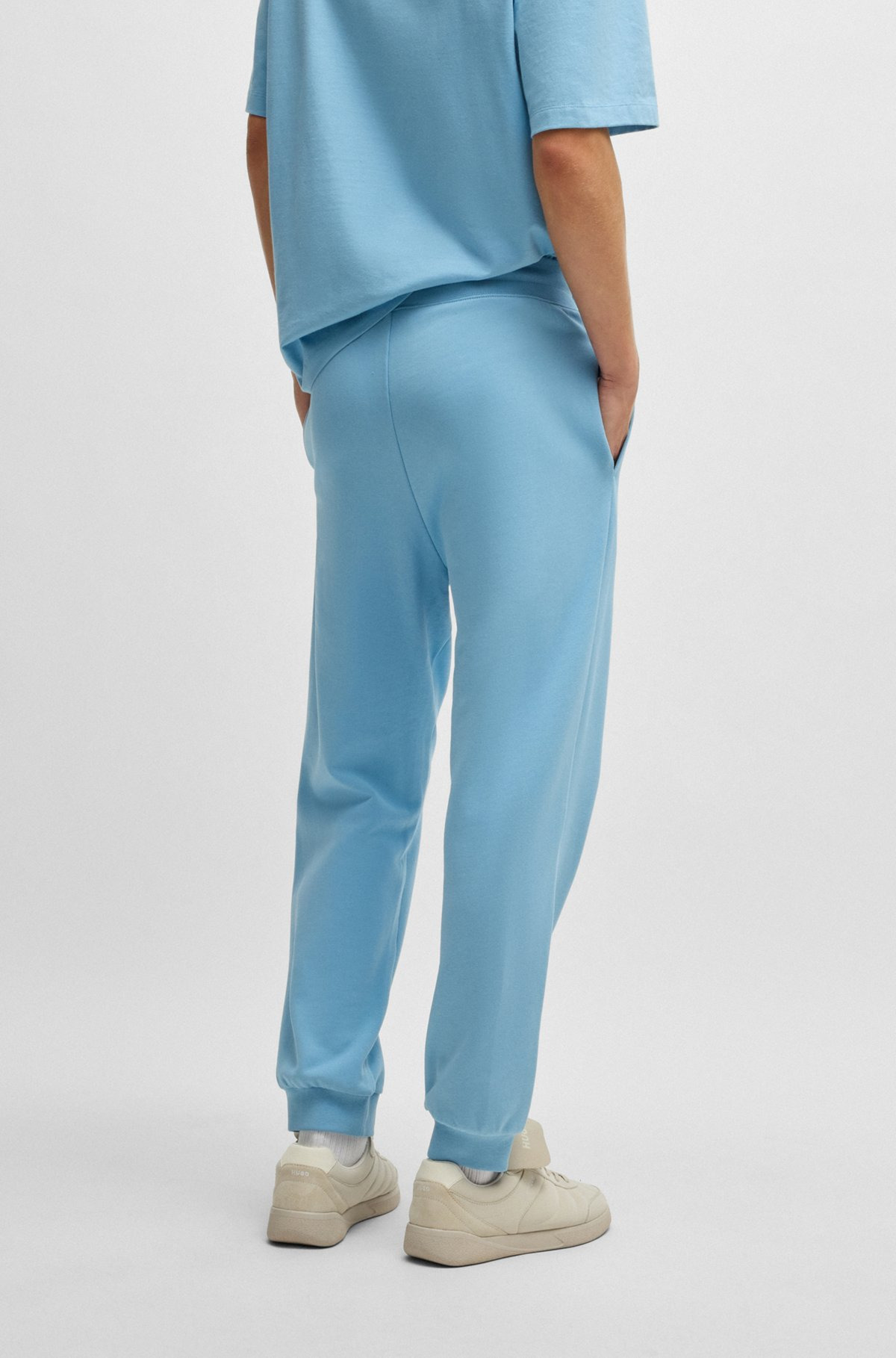 COTTON-TERRY TRACKSUIT BOTTOMS WITH HAPPY HUGO LOGO PATCH - 5