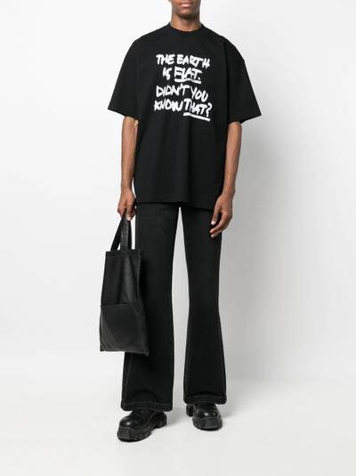 VETEMENTS slogan-print oversized T-shirt outlook