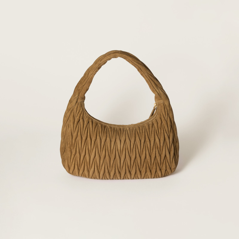 Wander matelassé suede bag 4
