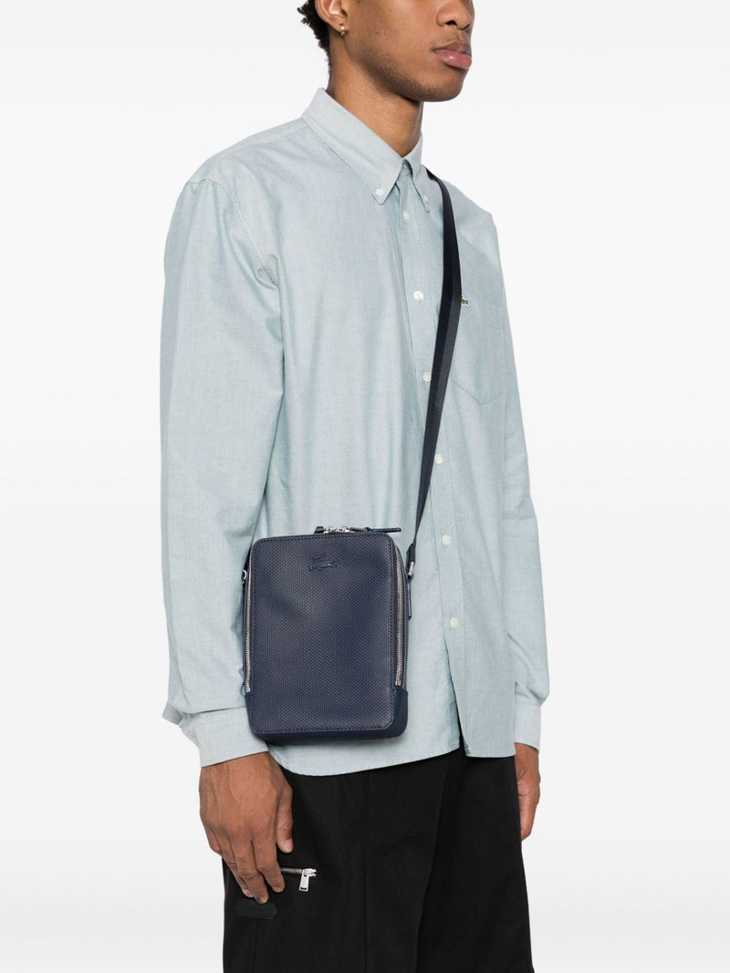 LACOSTE logo-embossed messenger bag outlook