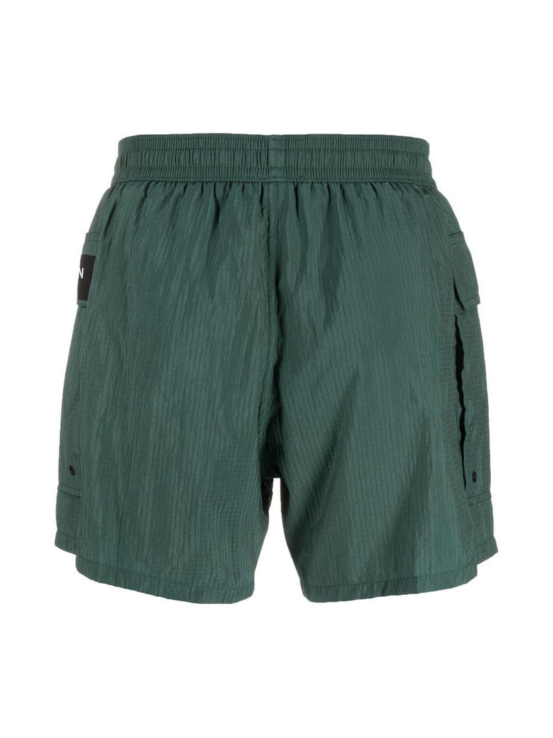 Balmain logo-patch drawstring swim shorts outlook