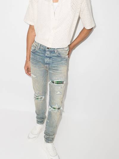 AMIRI ripped-finish skinny jeans outlook