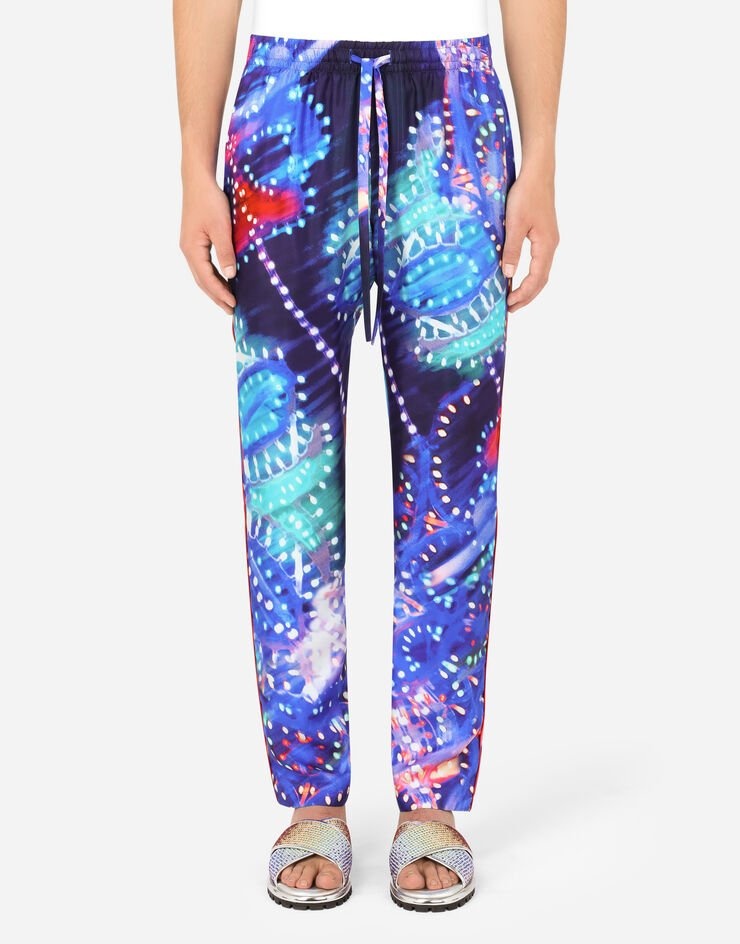 Silk jogging pants with illumination print - 1