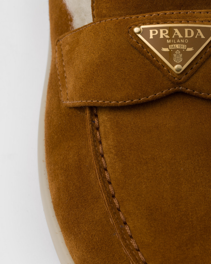 Suede and shearling loafers 7