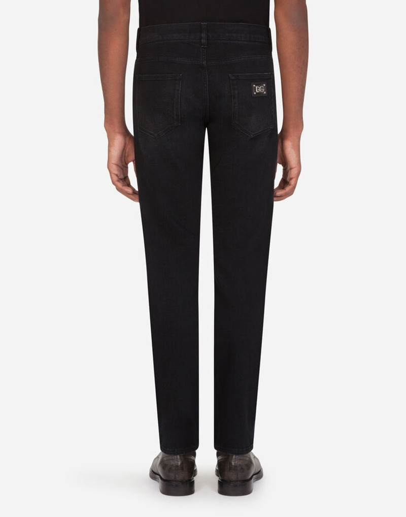 Washed black slim-fit stretch jeans with patch detailing 3