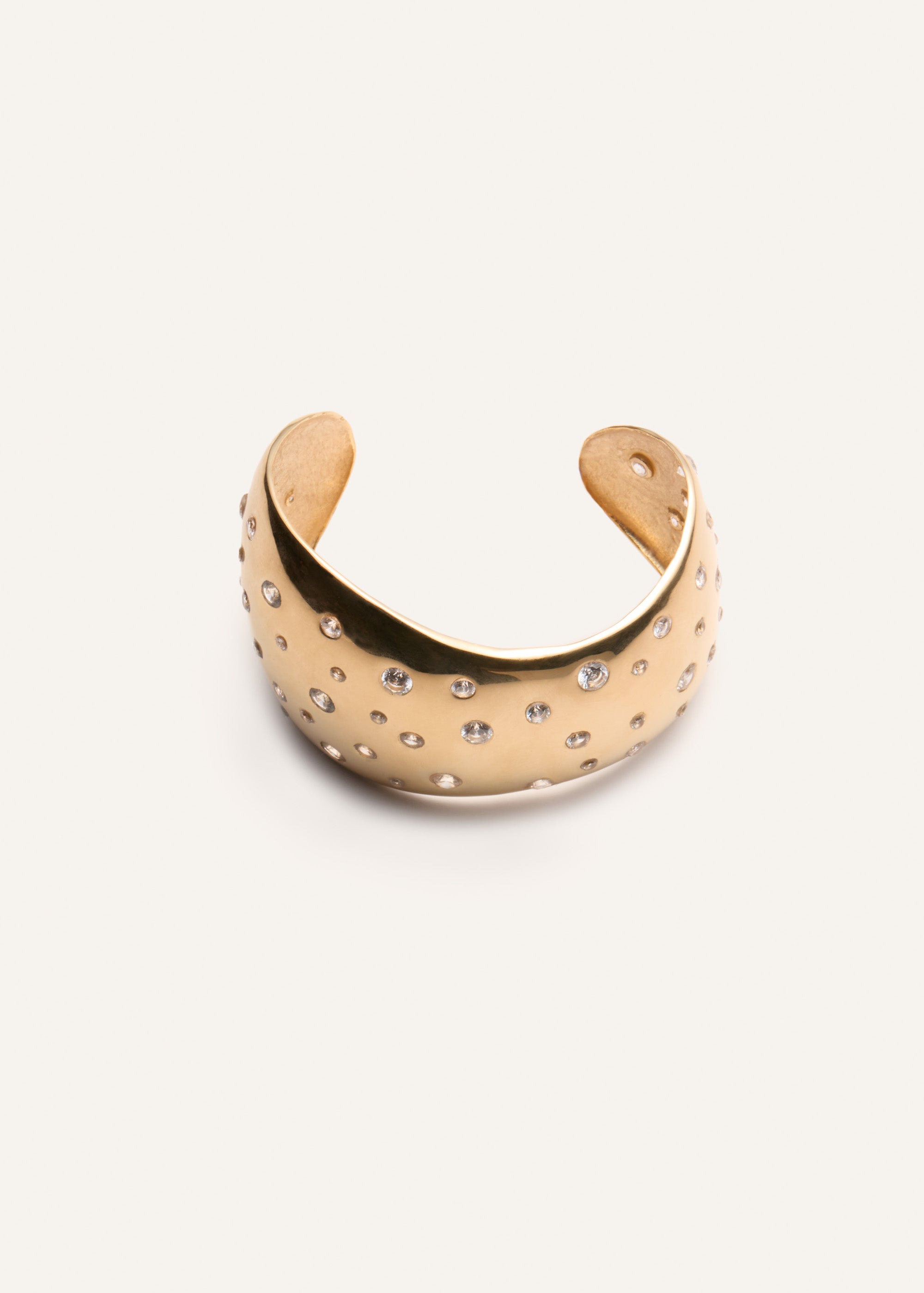 Crystal-studded bracelet in gold - 1