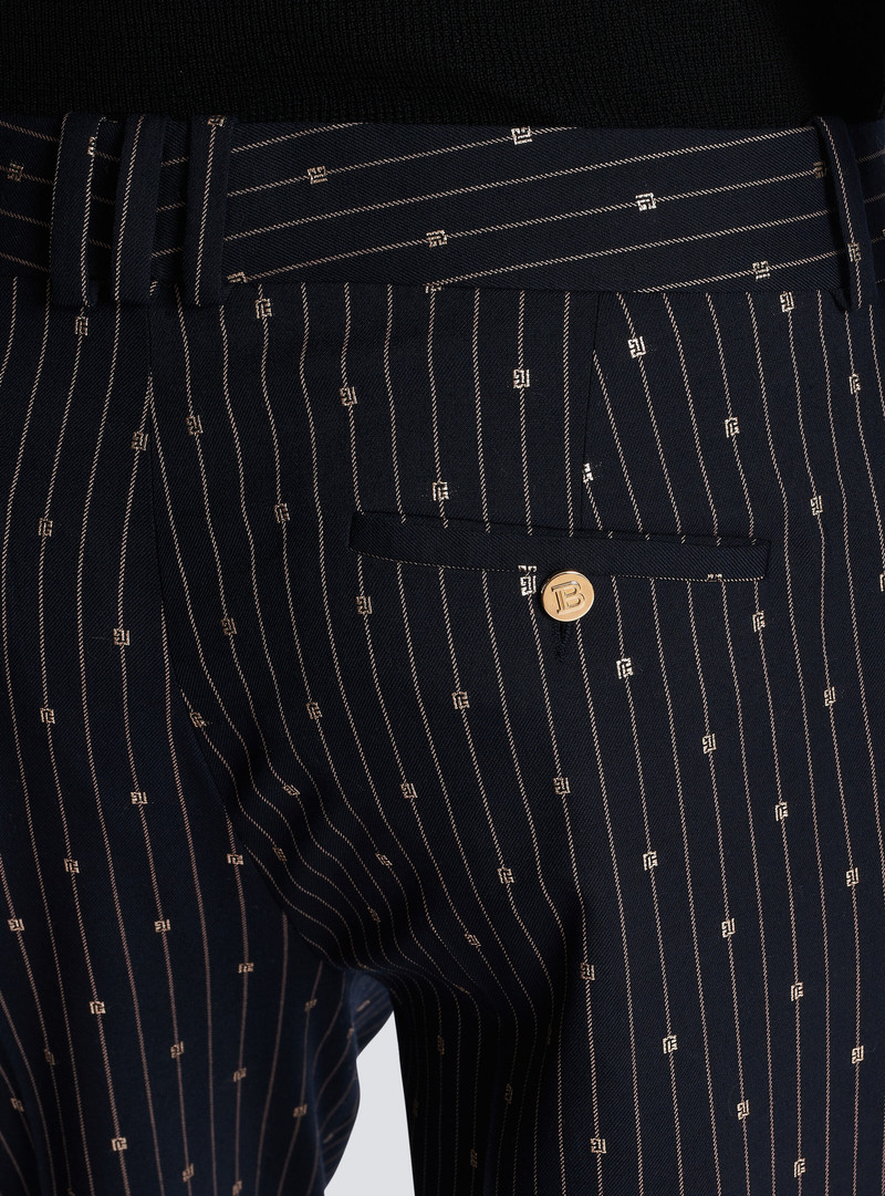 Monogrammed wool trousers with creases and thin stripes 6