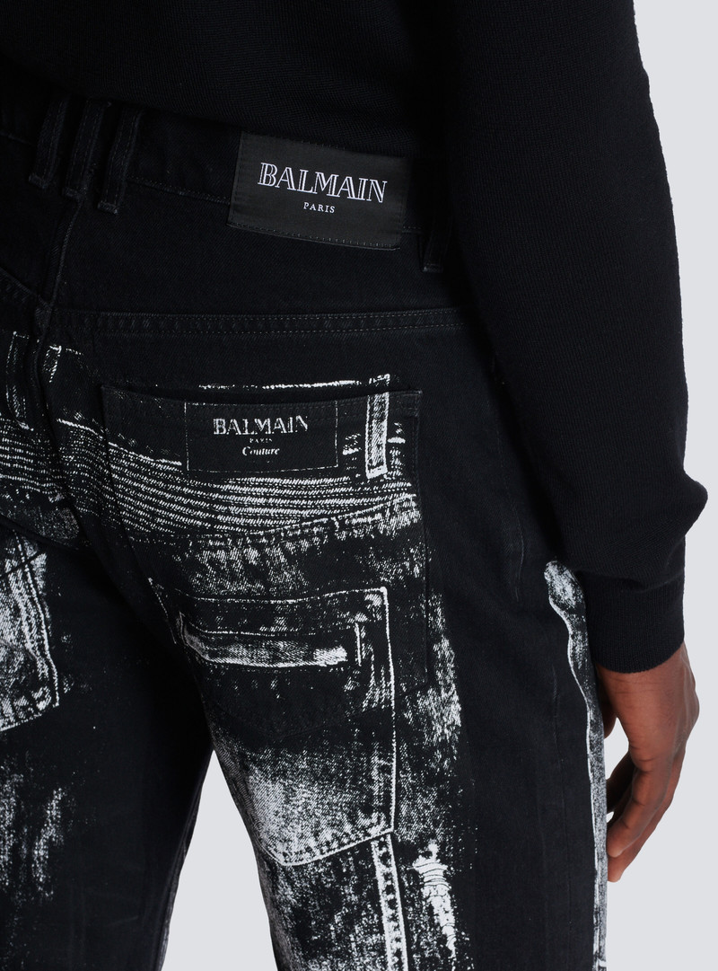 Loose-fit denim jeans with a biker print 6