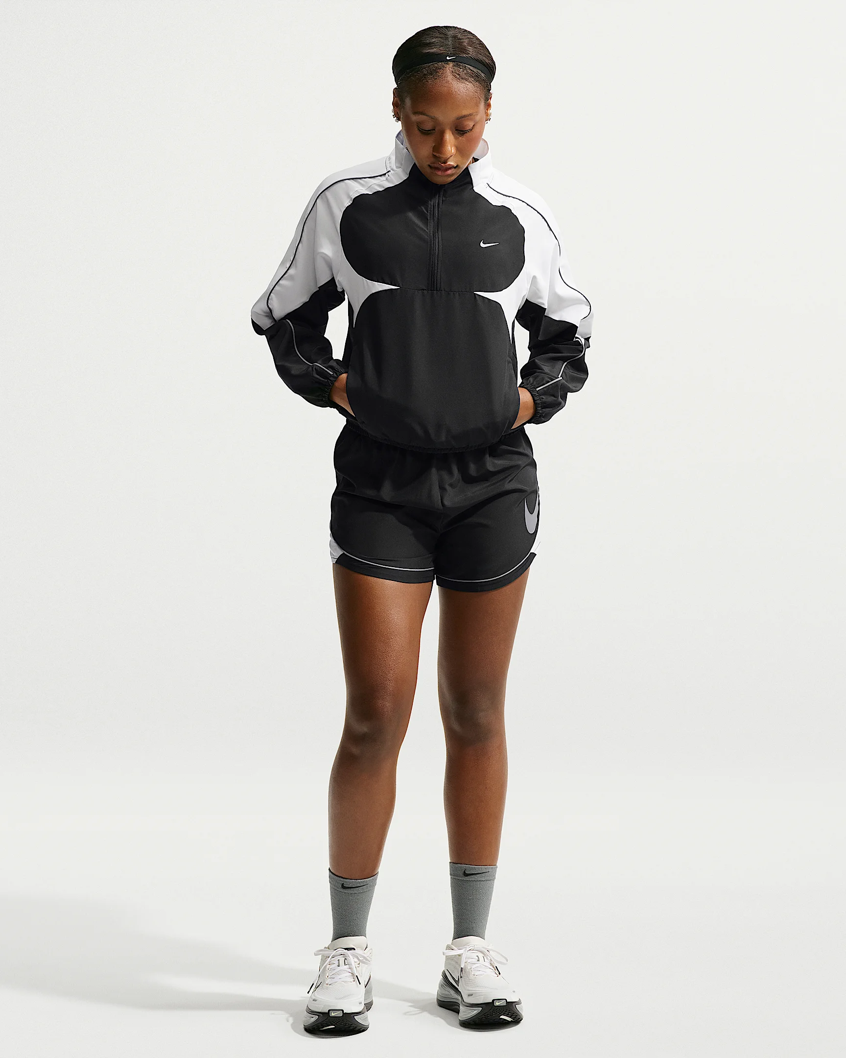 Nike Swoosh Women's Dri-FIT Mid-Rise Unlined Running Shorts - 1