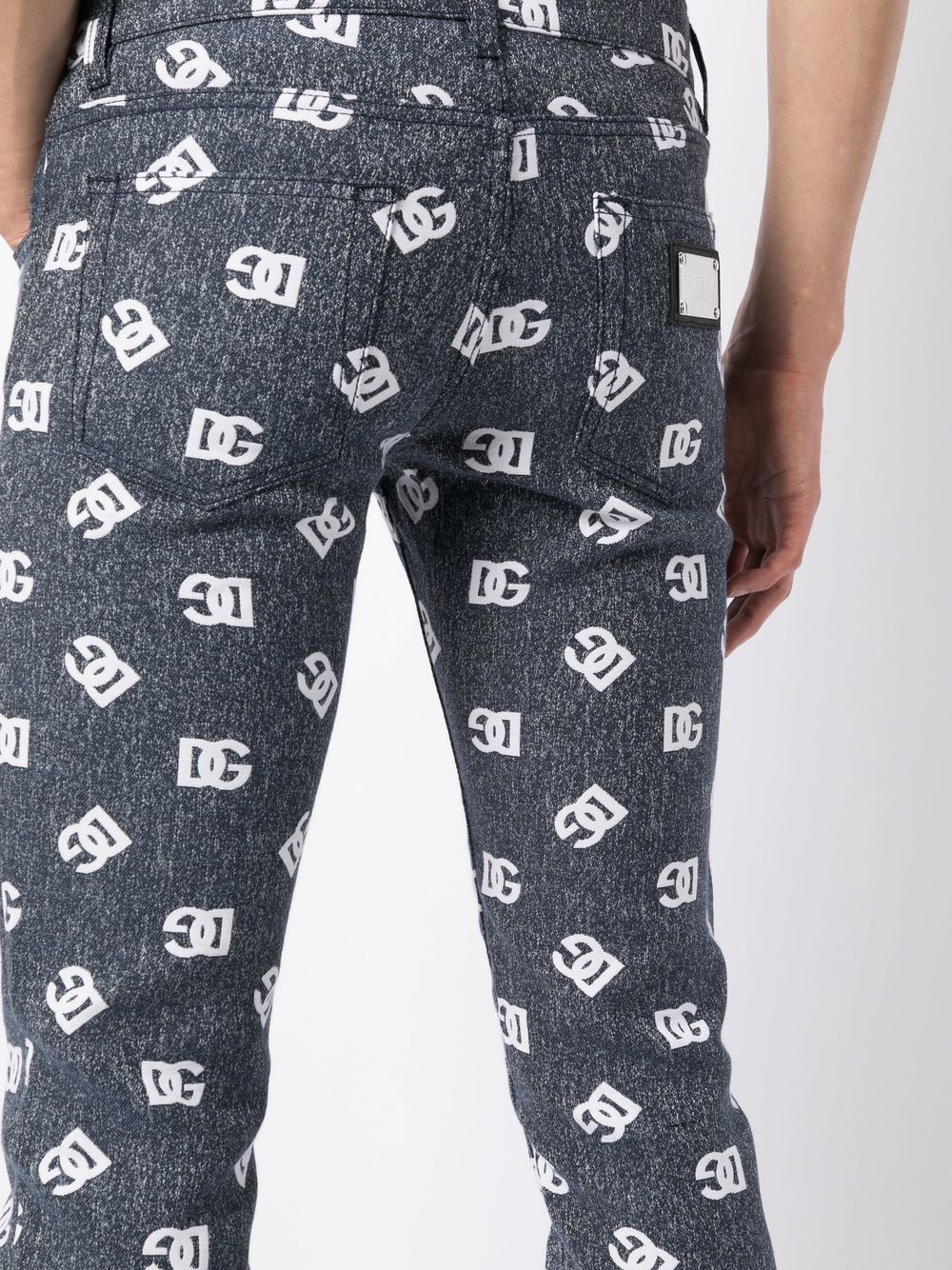 slim-cut monogram-print jeans - 5