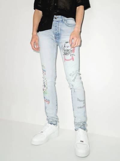 AMIRI x Zig Zag motif-print skinny jeans outlook