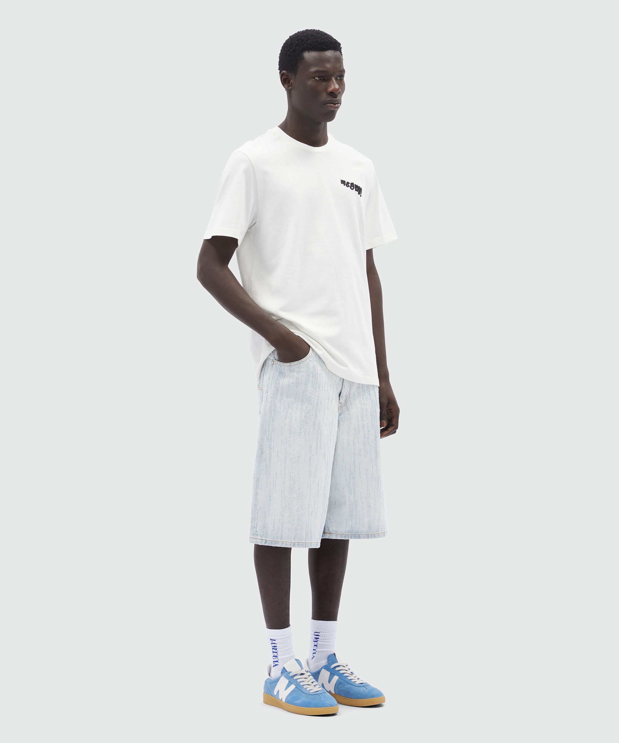 Bermuda shorts in light denim with a destroyed effect - 4