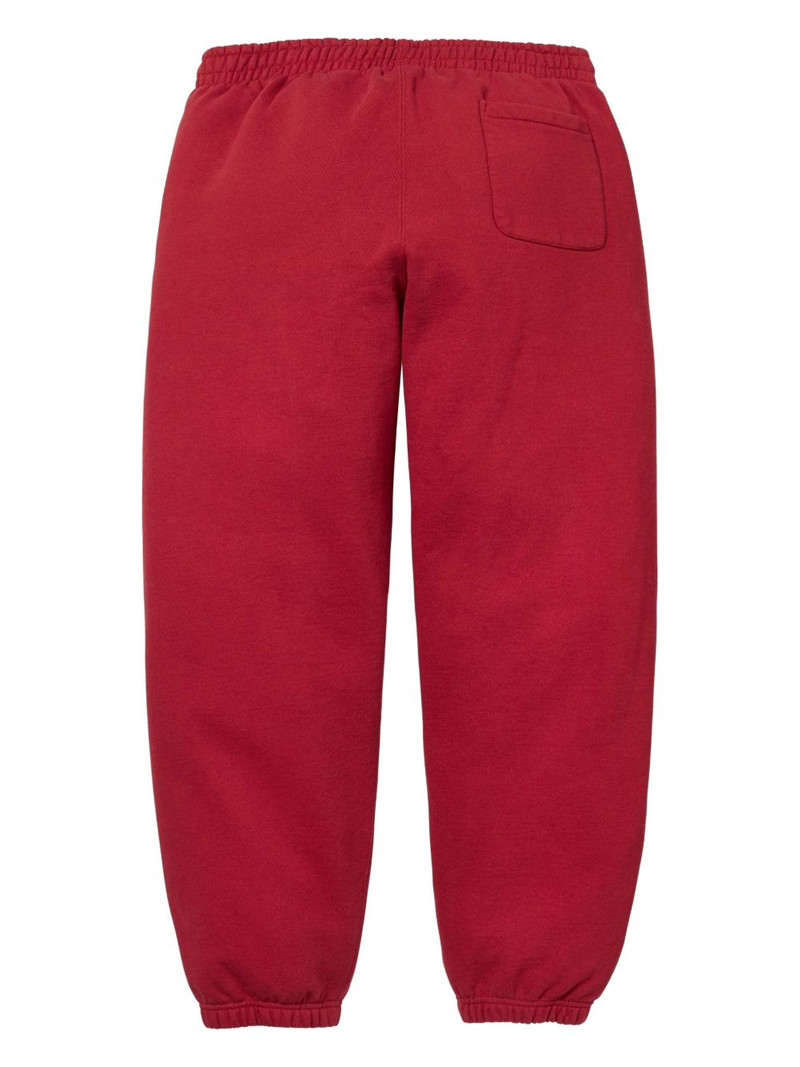 Supreme satin-appliqué track pants outlook