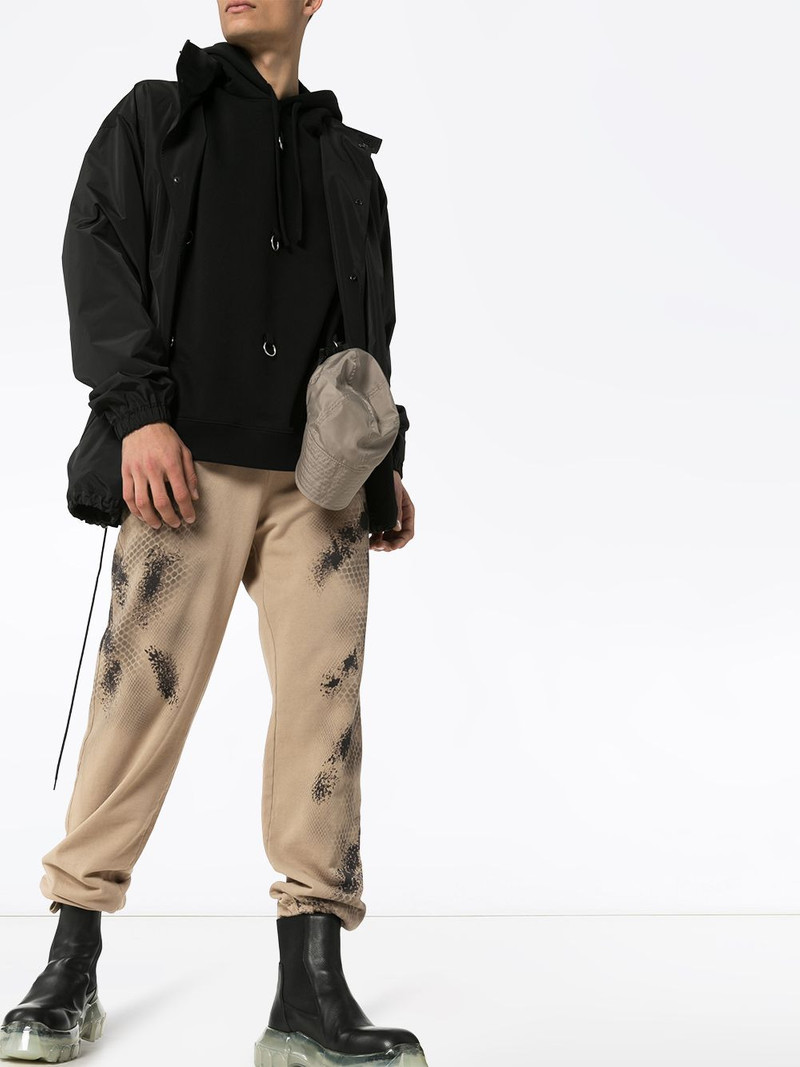 1017 ALYX 9SM abstract printed track pants outlook