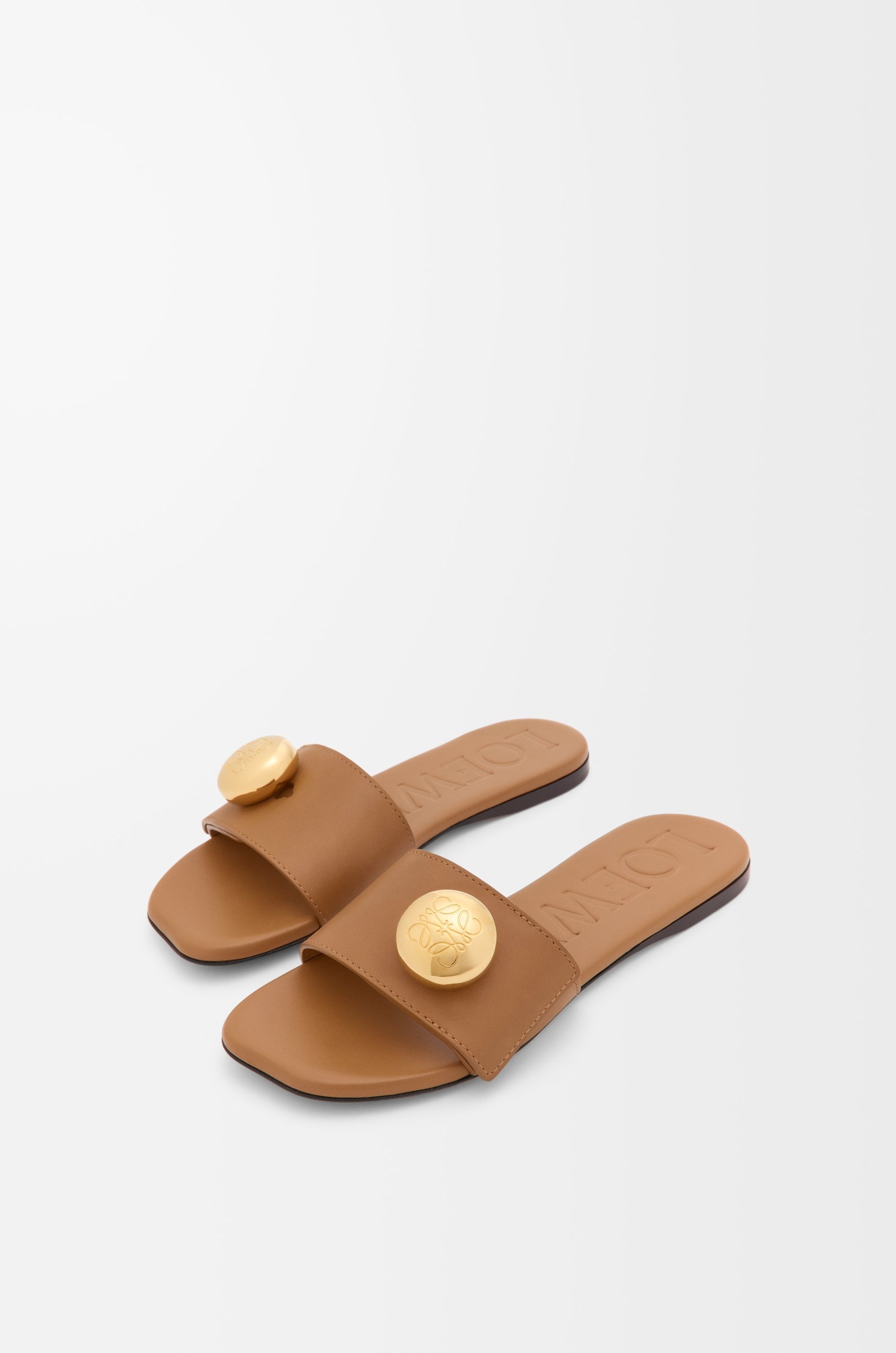Loewe Pebble slide in soft calfskin | REVERSIBLE