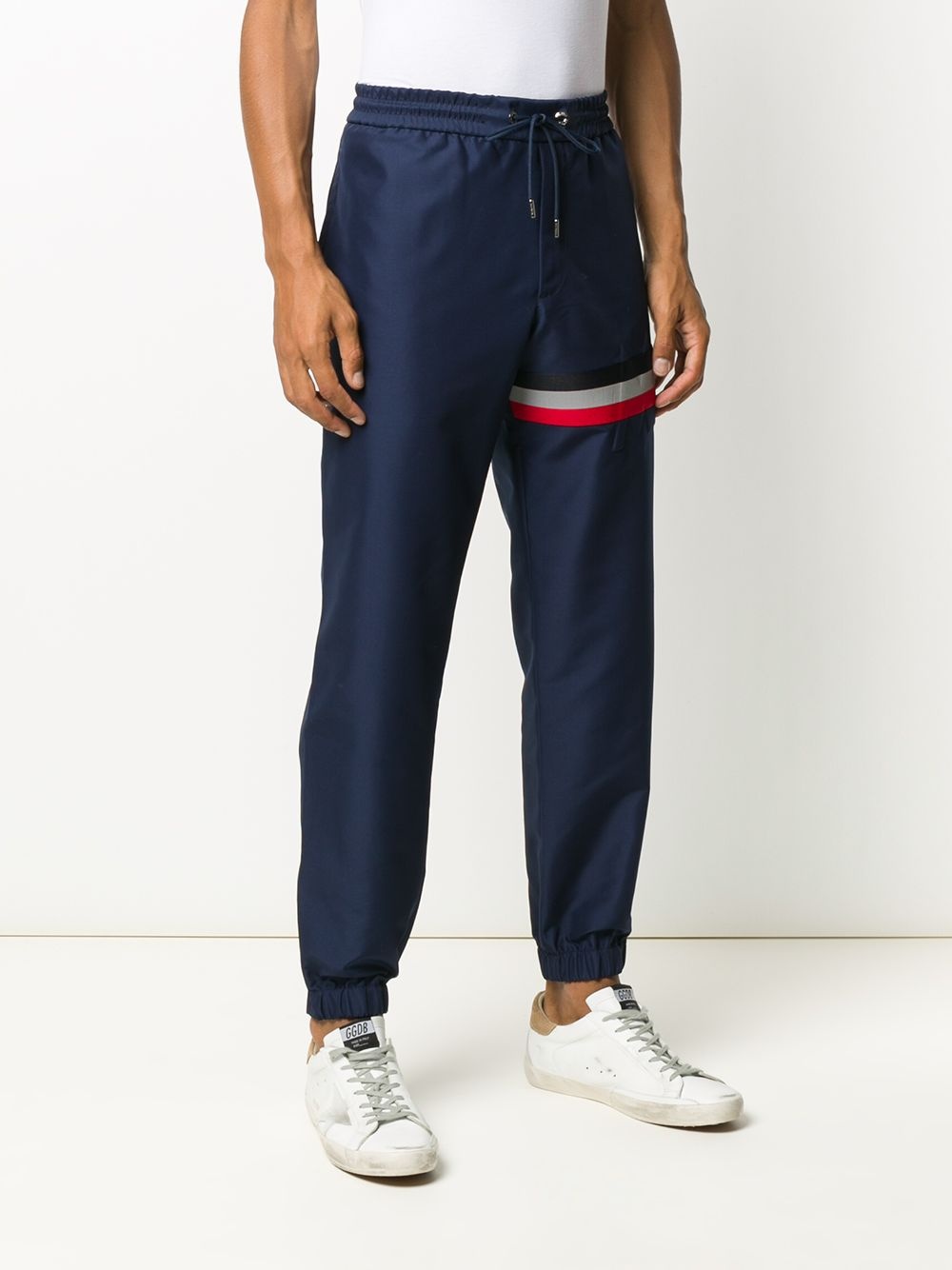 debossed logo navy trousers - 3