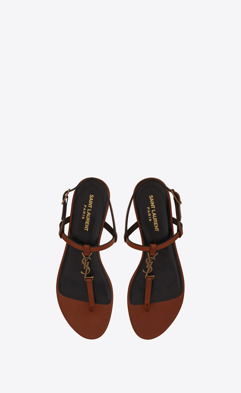 SAINT LAURENT cassandra flat sandals in leather with gold-tone monogram outlook