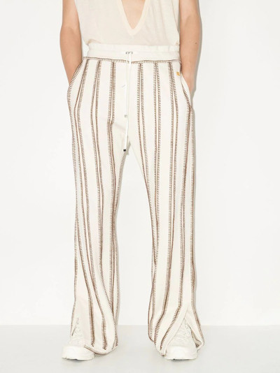 AMIRI flared striped track pants outlook