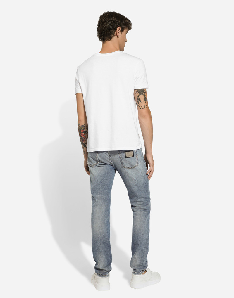 Slim-fit blue stretch denim jeans with abrasions 3