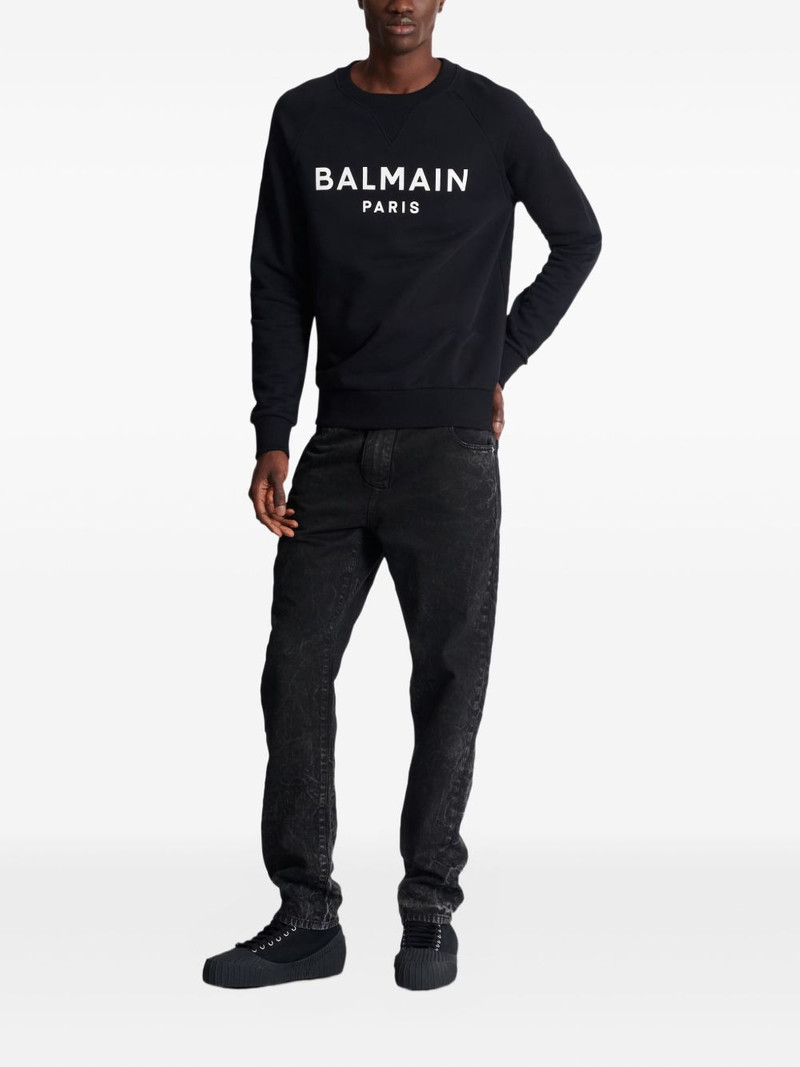 Balmain acid-wash jeans outlook