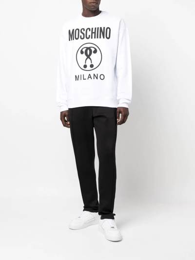 Moschino logo-print track pants outlook