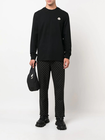 Moncler monogram-print track pants outlook