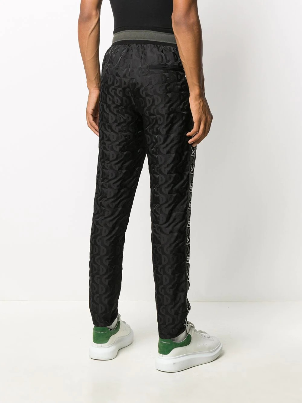 all-over logo print track pants - 4