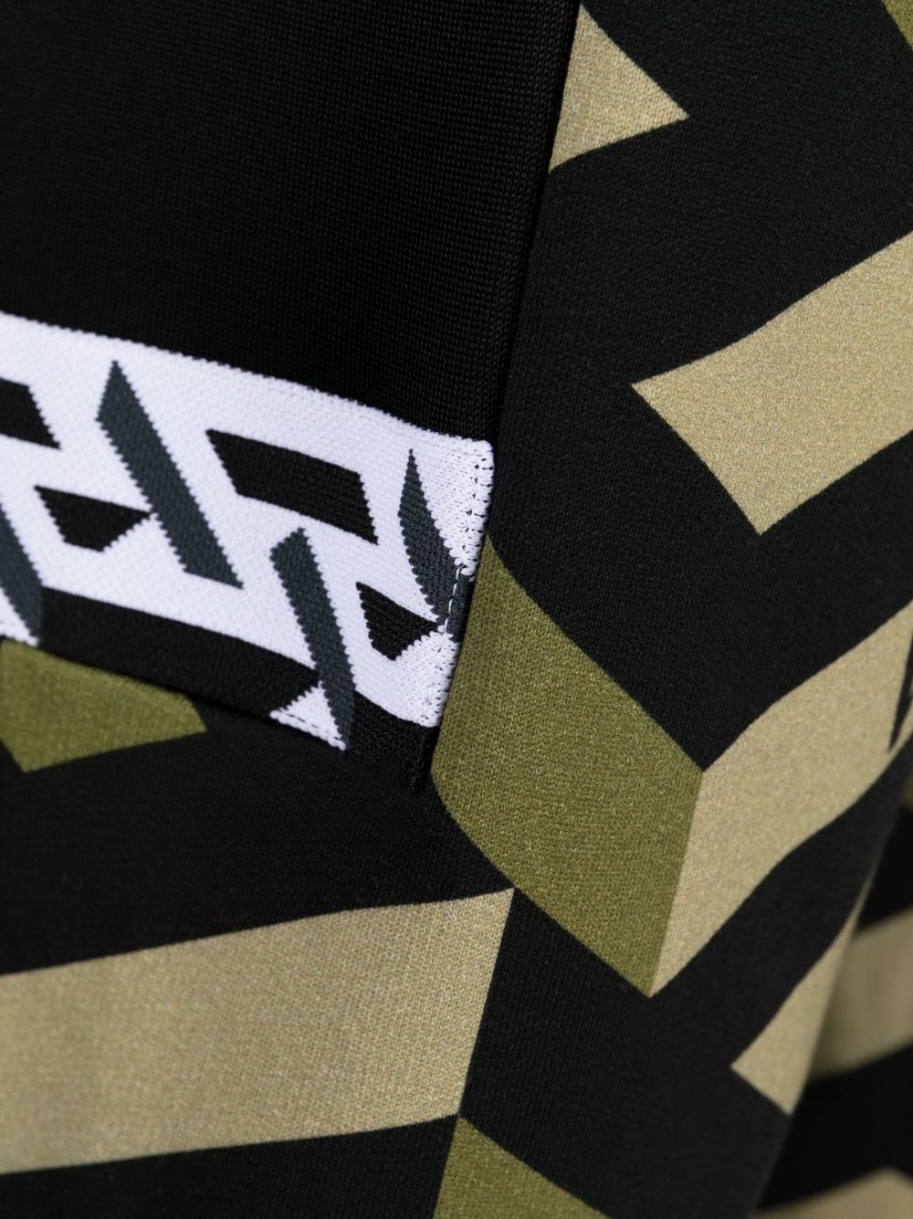 Greca-pattern logo-print trousers - 6