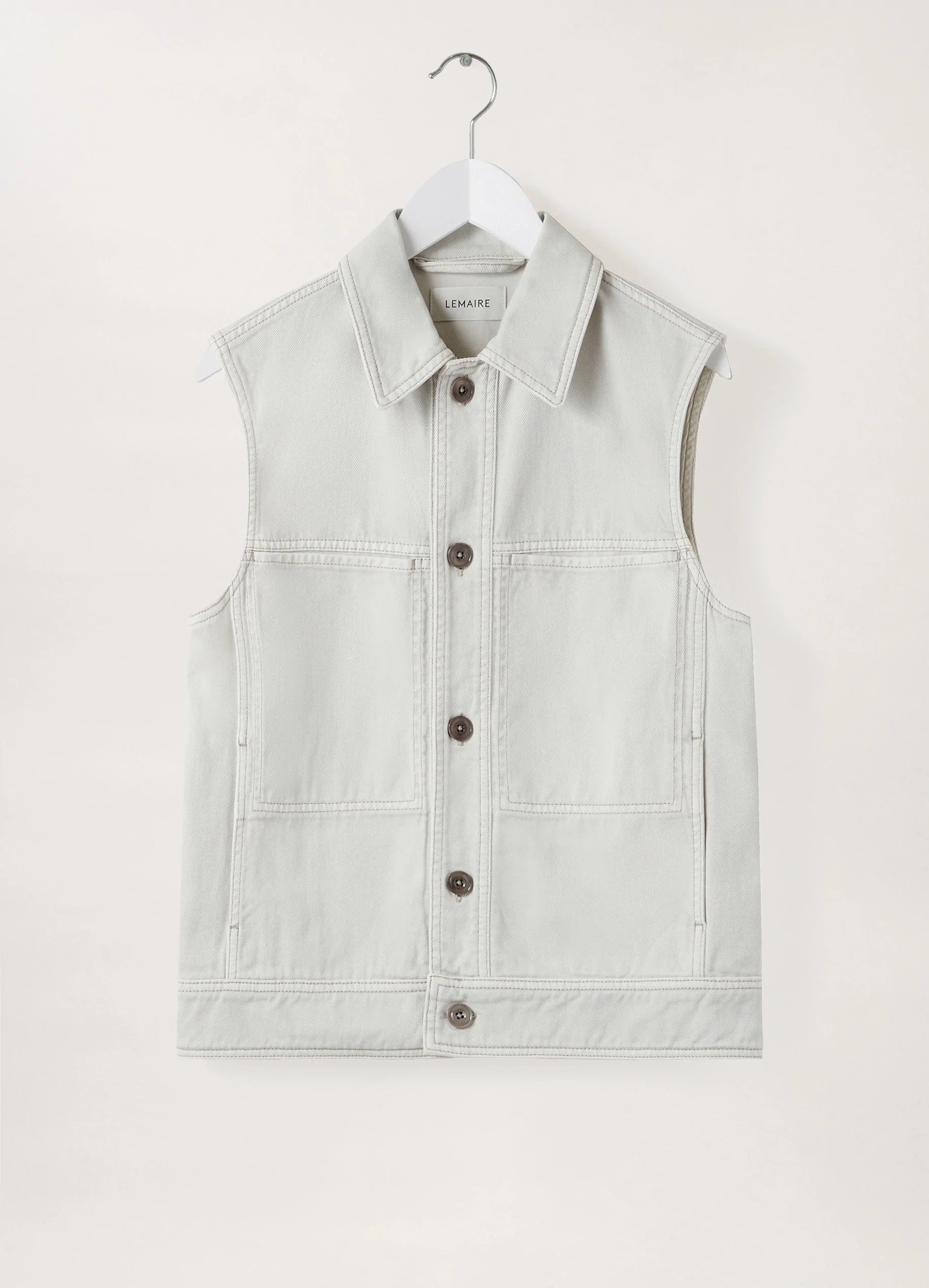 DENIM SLEEVELESS JACKET
SNOWY DENIM - 1