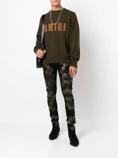 AMIRI star-patch detail skinny jeans outlook