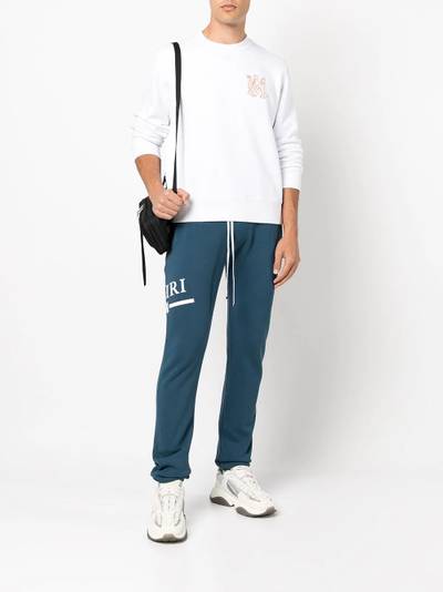 AMIRI logo print track pants outlook