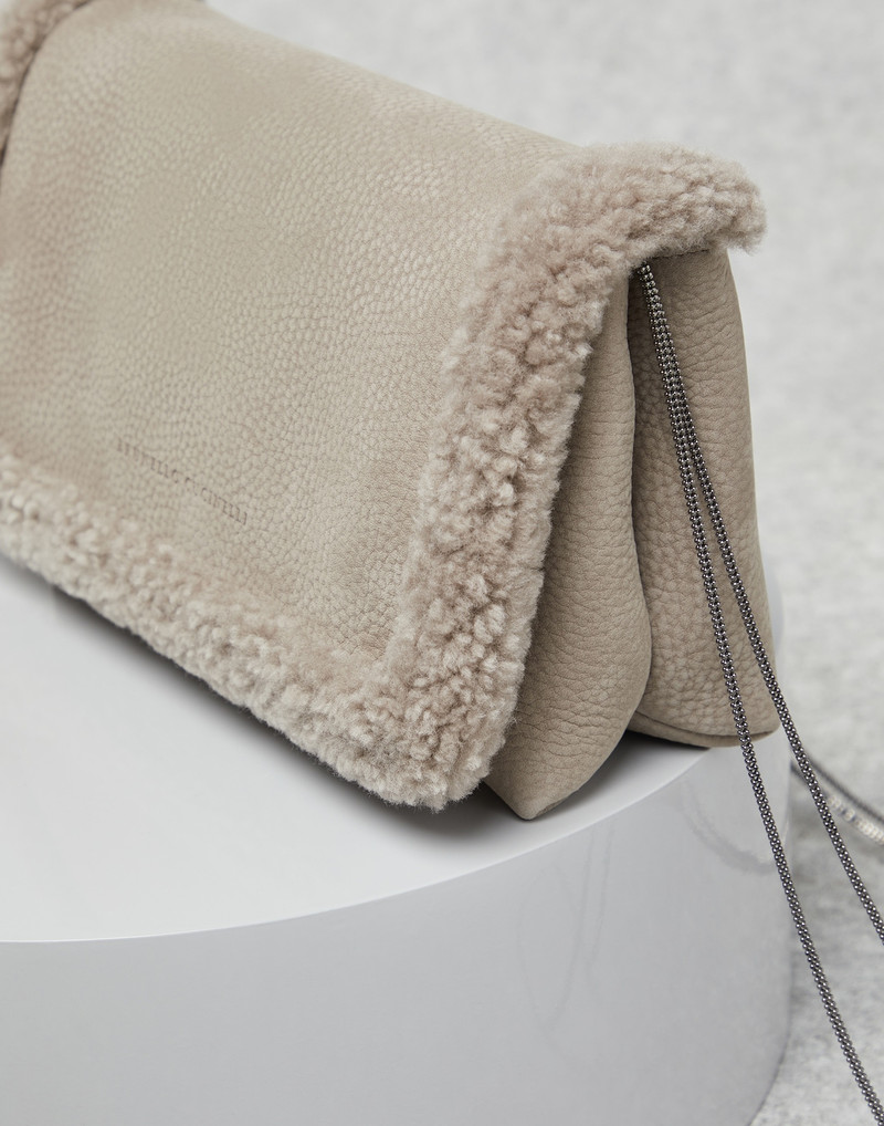 Nubuck city bag with shearling trims and precious chain 3