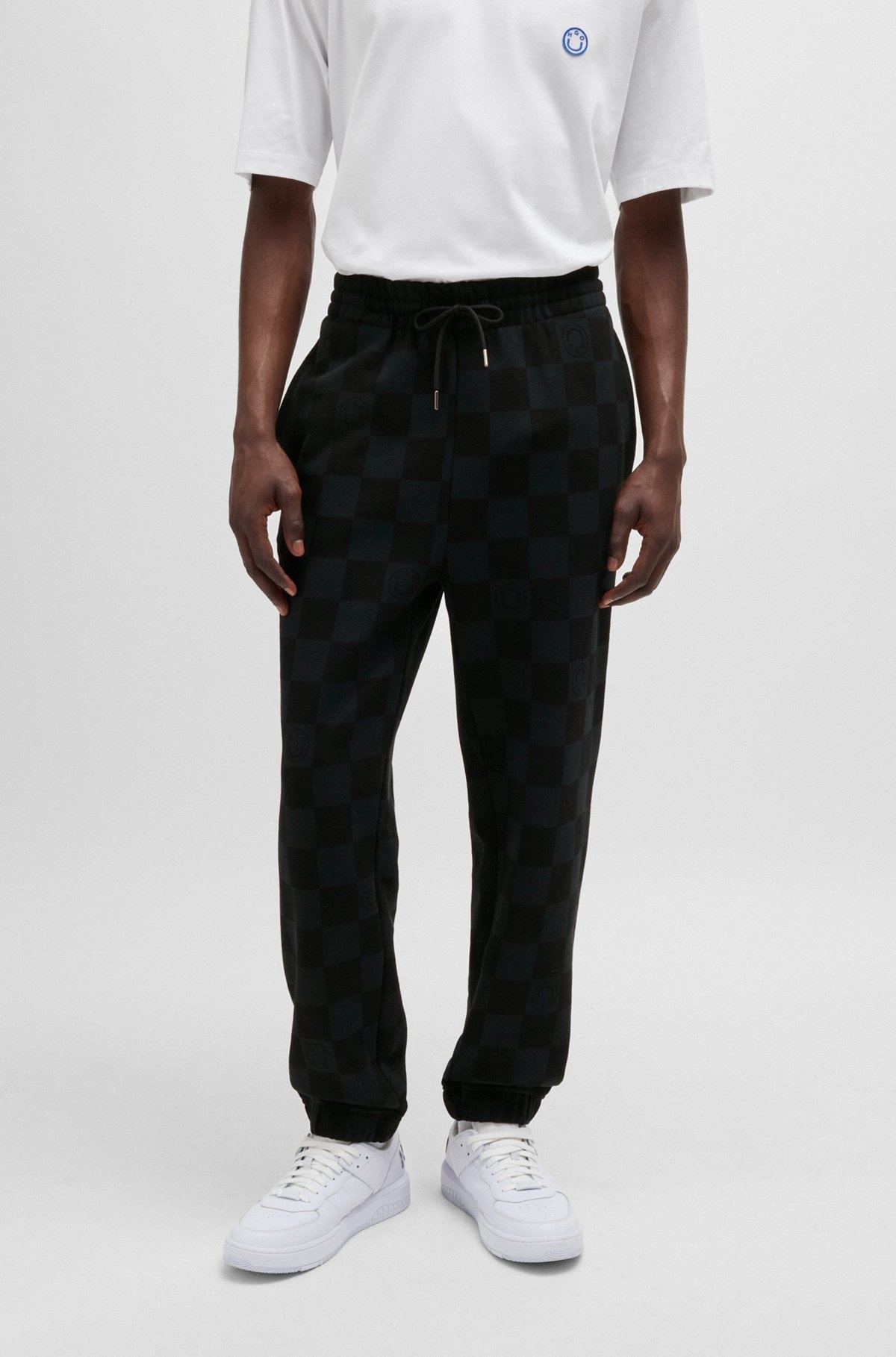 LOOSE-FIT TRACKSUIT BOTTOMS WITH CHECKERBOARD PRINT - 2