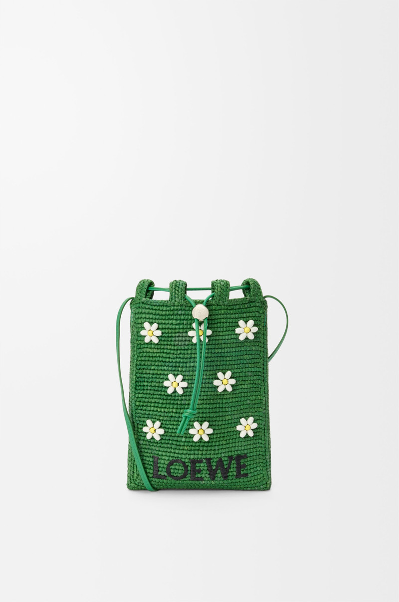 Drawstring pocket in raffia 1