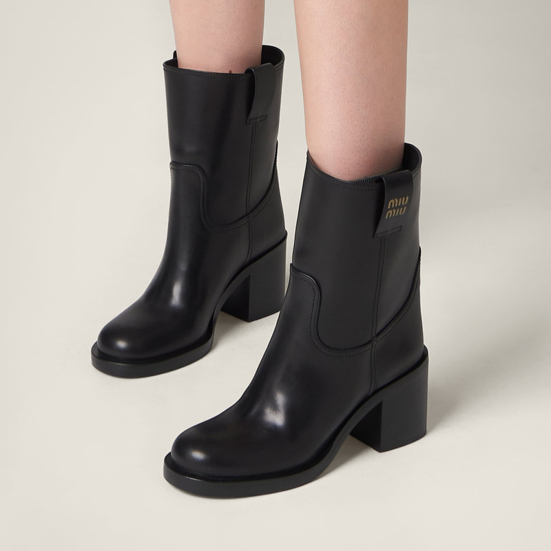 Miu Miu Leather booties outlook
