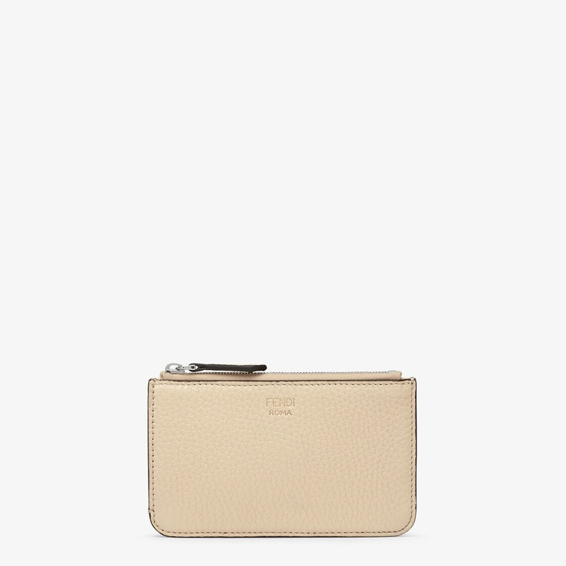 Fendi Roma key pouch with gusseted sides. The back features four card slots. Inside there is a pull- 1