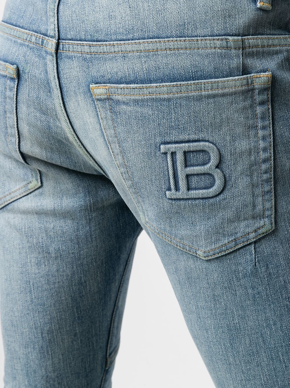 logo-embossed slim-fit jeans - 5