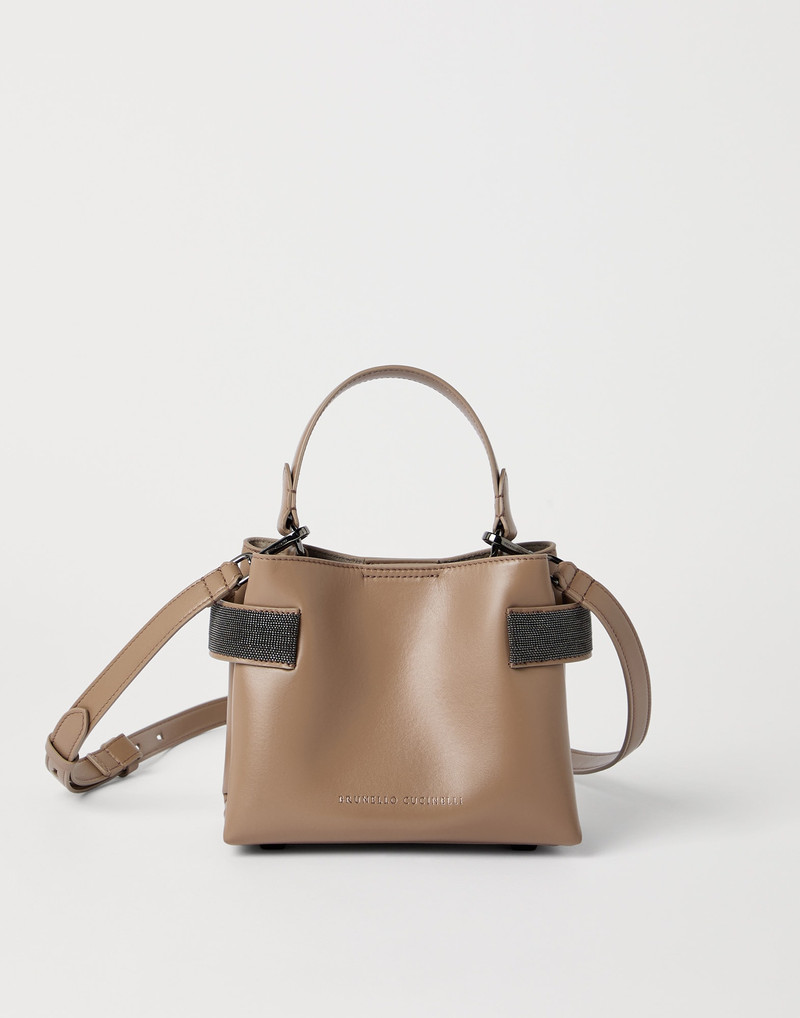 Essence small top-handle bag in calfskin with precious bands 1