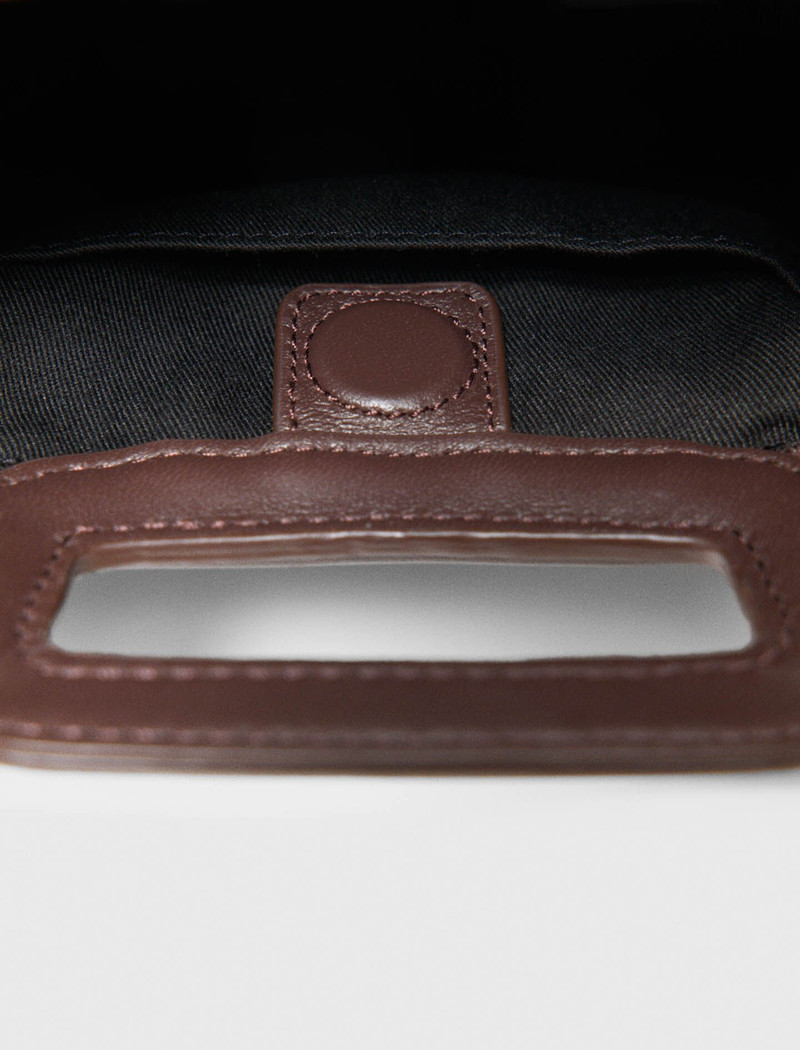 Mipli bouclé effect clutch bag 7
