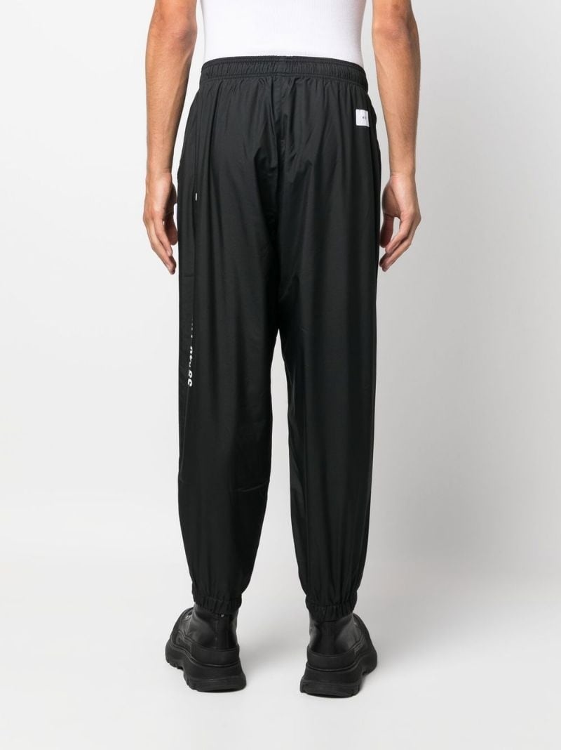 WTAPS Incom tapered track pants | REVERSIBLE