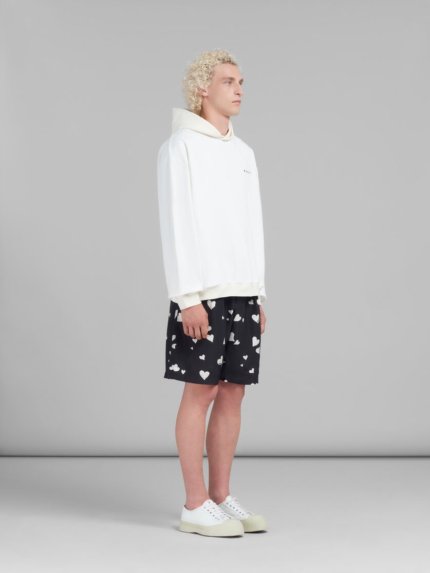 WHITE HOODIE WITH HEARTS PRINT - 5