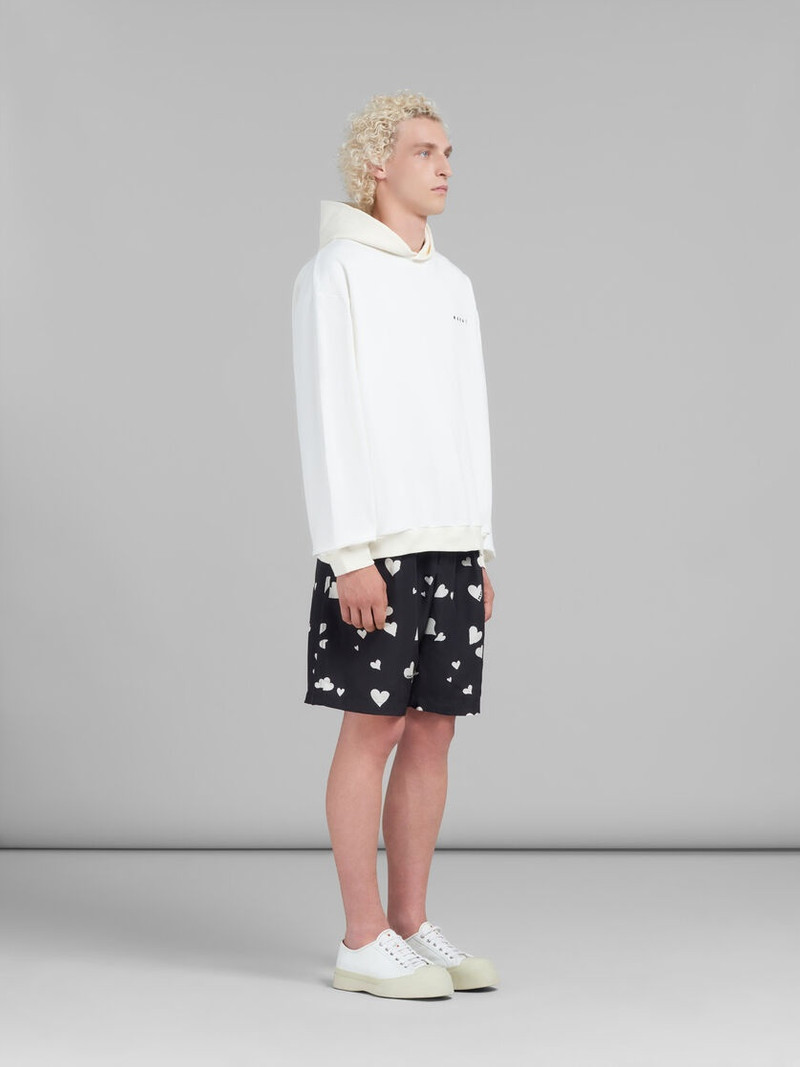 WHITE HOODIE WITH HEARTS PRINT 5