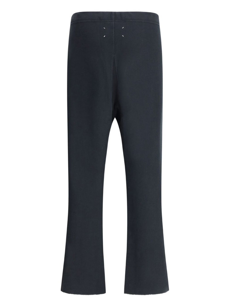 Maison Margiela flared raw-edge trousers outlook
