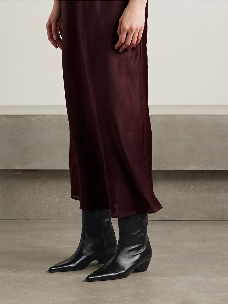KHAITE Sybil glossed-leather knee boots Black outlook