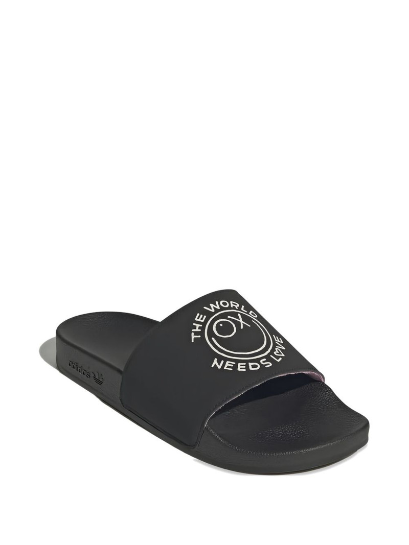 adidas Adilette "André Saraiva The World Needs Love" slides outlook
