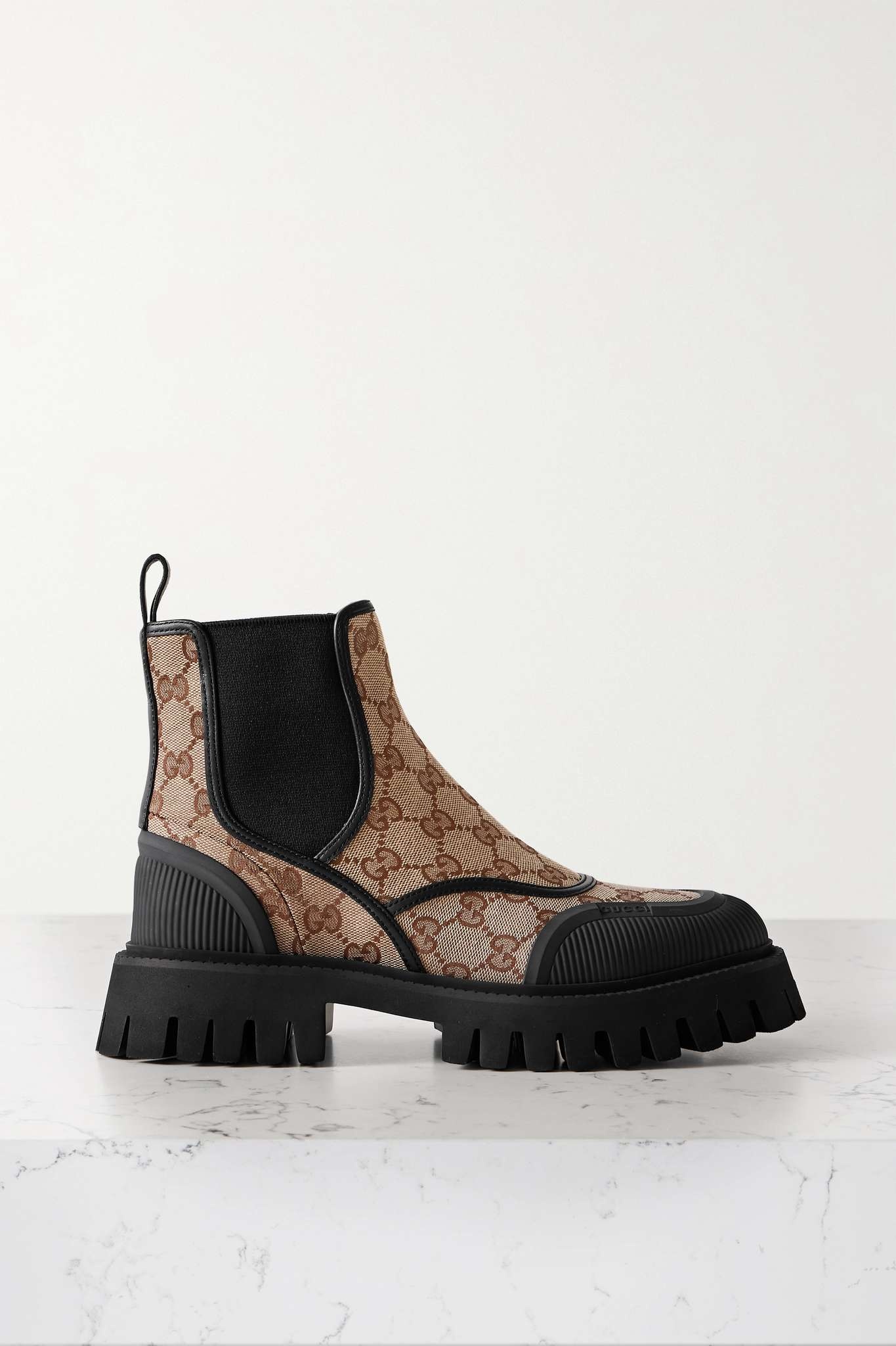 Rubber and leather-trimmed canvas-jacquard ankle boots - 1